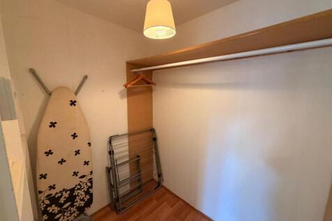 storage cupboard in bedroom .jpeg