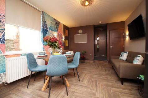 Modern living area with vibrant feature walls...