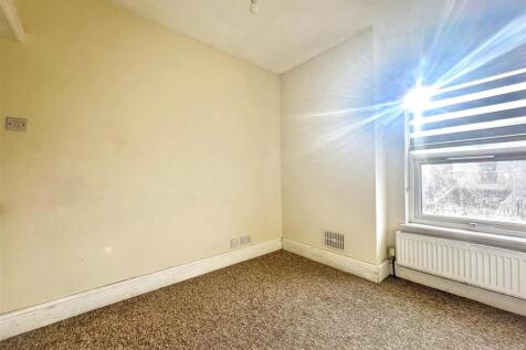 Bright bedroom space with plenty of natural lig...