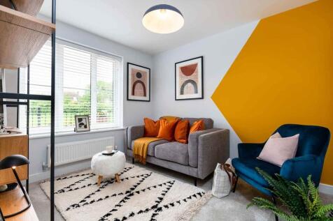 The family room at the front of the house could be used as a playroom or study