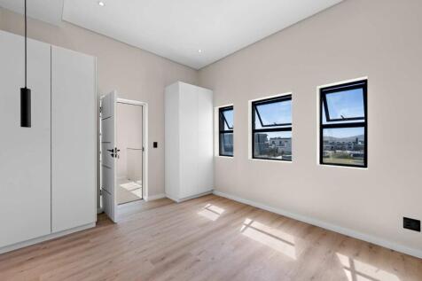 Third bedroom with built in cupboards
