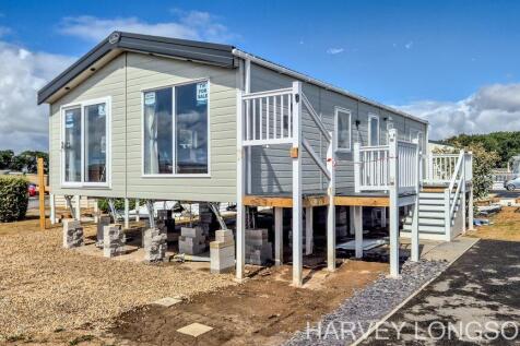 Exterior of ABI Superior holiday lodge with deckin