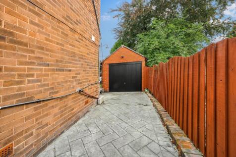 Side leading to Detached Garage