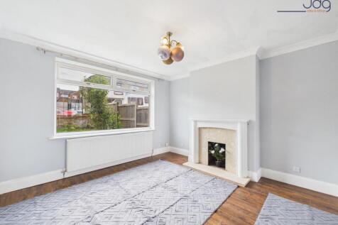 Open Living/Dining Room with Feature Fireplace
