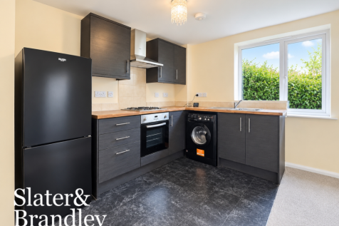 Modern Charcoal Kitchen with Garden Views