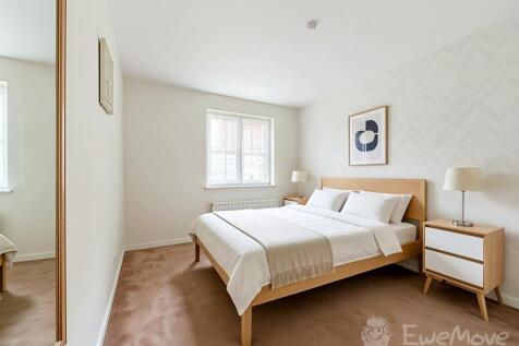 Large Double Bedroom facing front with maple fitte