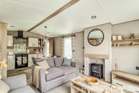 ABI Beverley living room with feature fireplace an