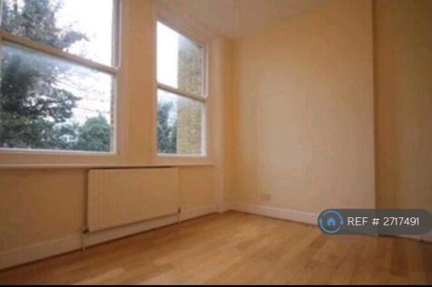 Double Bedroom With Large Windows And Ceilings