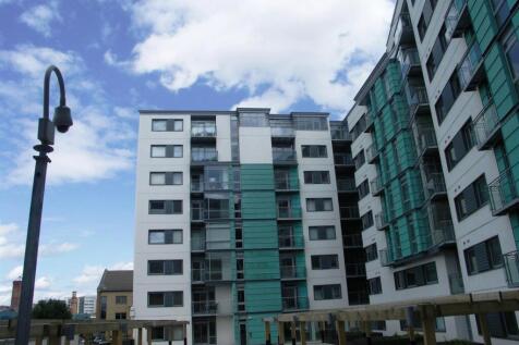 Modern apartment building with bright balconies...