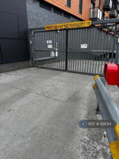 Secure Gated Entrance To The Underground Car Park