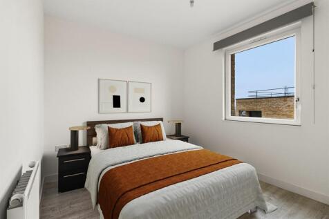 Experience comfort and style in this beautifully designed bedroom.