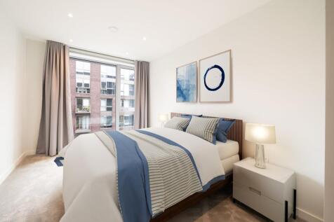 Experience comfort in this beautifully designed bedroom with city views.