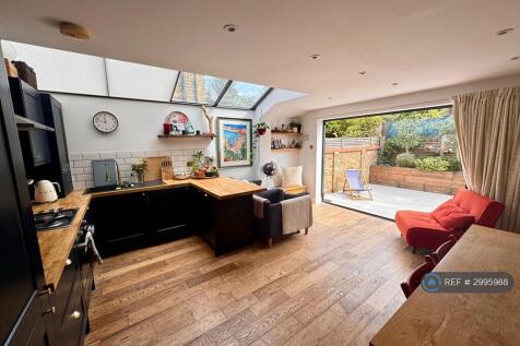 Kitchen And Entertainment Area
