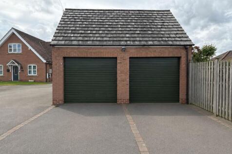 Left Garage With Property