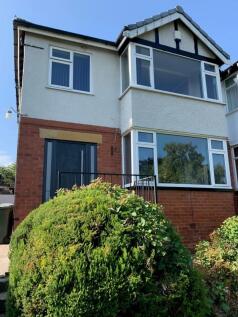 Exterior view of a charming house with a brick ...