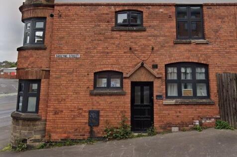 Charming red brick exterior with stylish window...