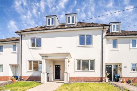 Bright, modern terraced house with a neat front...