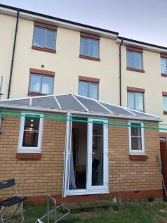 Well-maintained terraced property rear view wit...