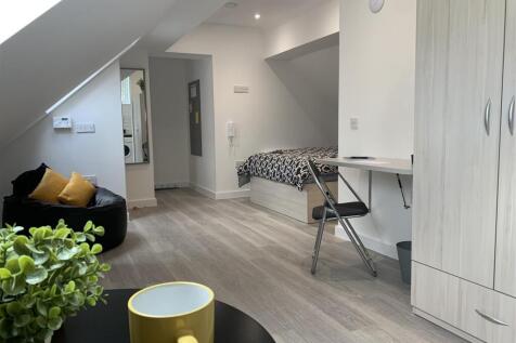 Bright modern bedroom with ample study space...