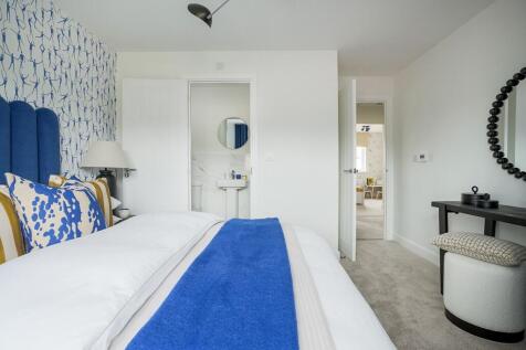 Main bedroom with ample space for storage and an en suite shower room