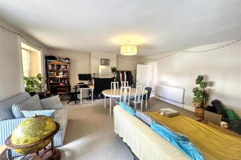 Spacious open living room with dining area...