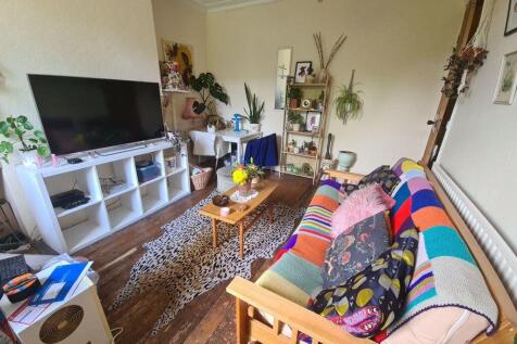 A cozy and inviting living room filled with nat...