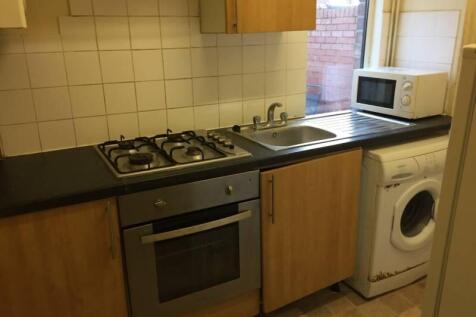 Compact fitted kitchen with gas hob, built-in o...
