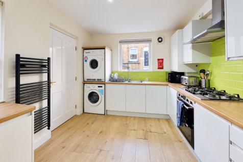Modern Lime-Green Tiled Utility Kitchen
