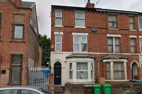 Traditional brick terrace with bay window....