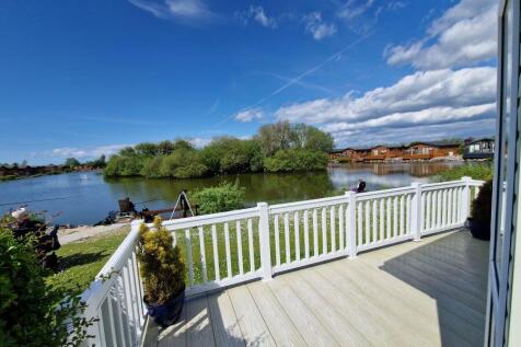 South Facing Decking Overlooking The Lake