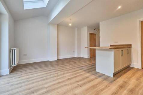 Open plan kitchen diner to rear