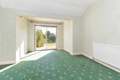 Cleared living room, garden view.png