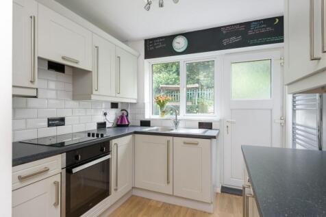KITCHEN SITTING ROOM AND DINING ROOM
