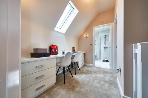 Space for a desk or additional storage on the top floor landing
