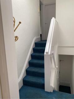 A clean and well-maintained staircase leading t...