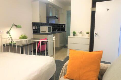 Bright and inviting single bedroom with a cozy ...