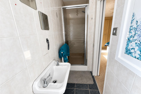 HIS &amp; HERS SHOWER ROOM