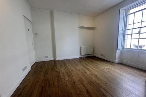 Bright airy room with beautiful wooden floors...