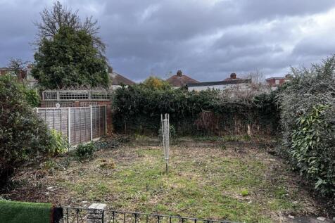 Private rear garden with established hedging an...