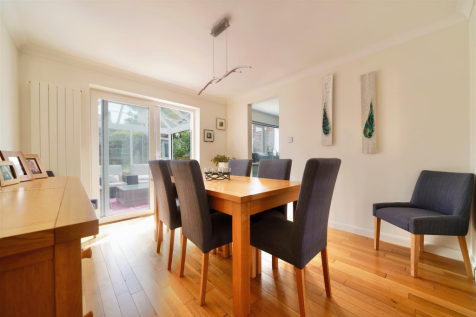 Dining room facing conservatory and garden.png