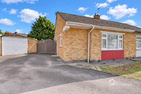 Sunny bungalow exterior, faithfully retouched-1.pn
