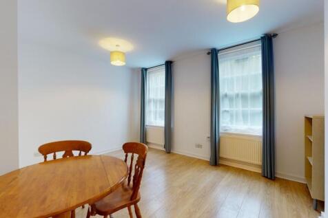 Bright, airy living space with large windows...
