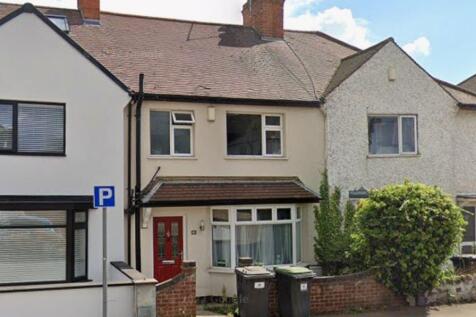 Charming terraced house with a classic bay wind...