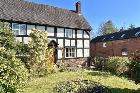 Cottage From Garden