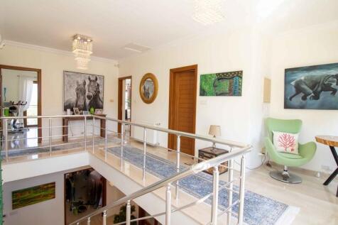 Seafront 4-bedroom magnificent resale villa,1,500 m2 plot size,fully furnished.5m x 10 m private pool,gas central heating,stone double garage,Title deed in the owner?s name VAT paid Image 9999 24