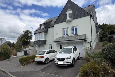 EXTERIOR SHOT WITH BLURRED NUMBER PLATES.jpg