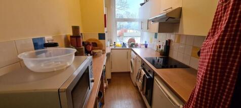 A well-maintained kitchen space with ample surf...