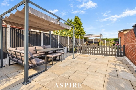 Sunlit Modern Pergola Patio Garden.png