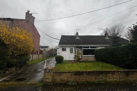 A 3 bedroomed semi detached dormer bungalow