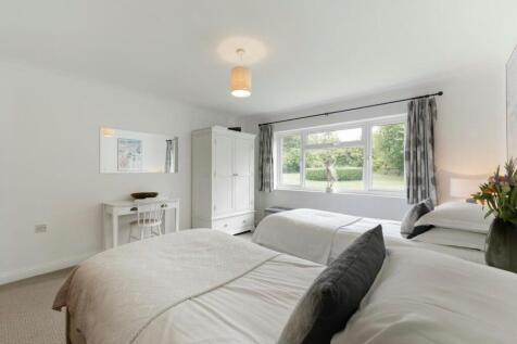 Bedroom three with garden views